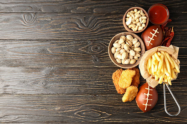 istock Concept of Super bowl snacks on dark background 2216006261