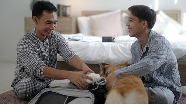 istock The gay couple is getting ready to take a trip. 2216006337
