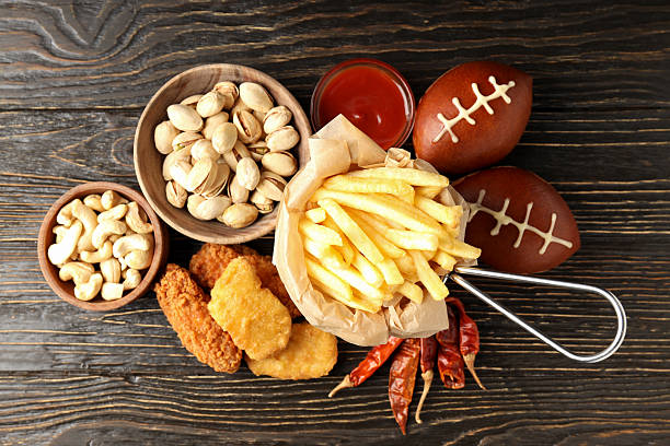 istock Concept of Super bowl snacks on dark background 2216007402