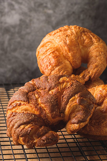 istock Chocolate Croissants Stacked on a Wire Rack, Cooling Rack 2216008123