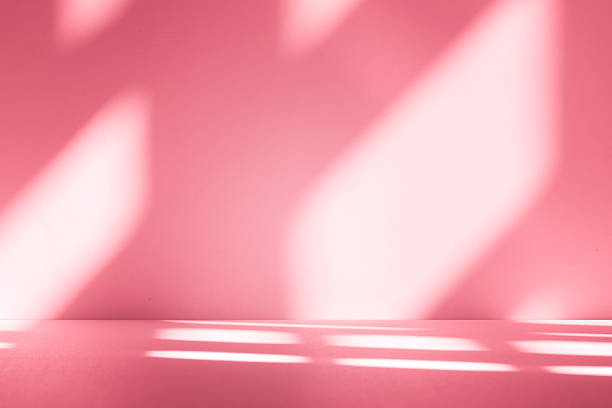 istock Wall interior background, studio, and backdrops show products. with shadow from window color white and pink light. background for text insertion and presentation of product 2216008200