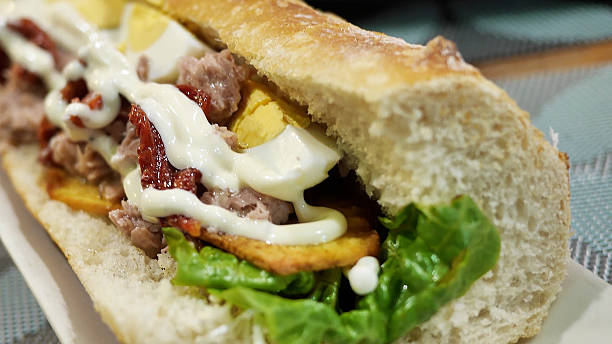 istock A Luang Prabang–style baguette sandwich filled with bacon, egg, and fried potatoes 2216010607