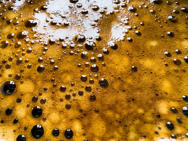 The surface of the hot coffee. Abstract background. macro, copy space