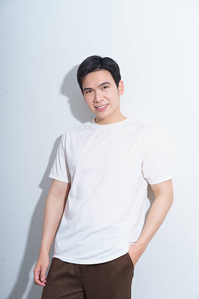 istock Smiling Man Posing Against White Background in Comfortable Casual Clothing 2216014001