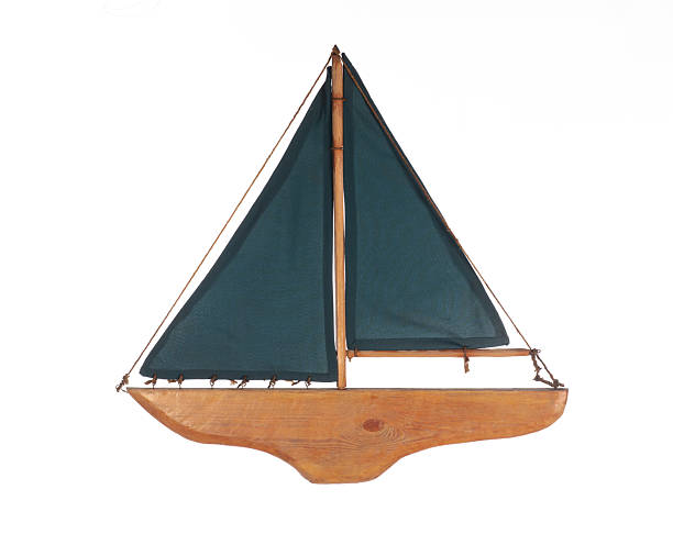 istock decorative wooden ship sailboat isolated on white background 2216015795