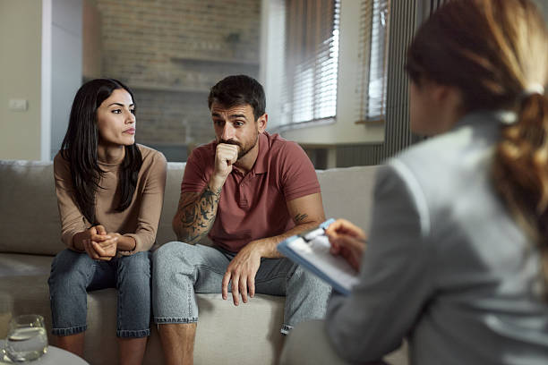 istock Displeased couple having a counseling session with therapist. 2216016781