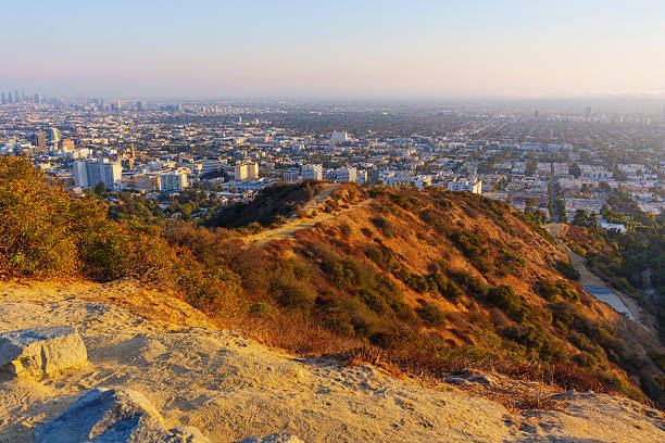 istock Runyon Canyon Park Worn Trails With Hazy LA Sunset 2216020546