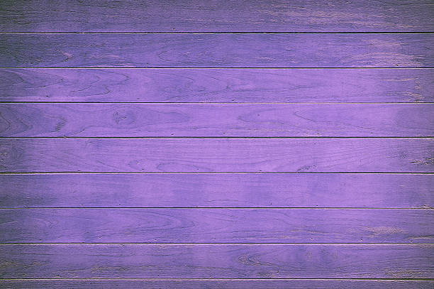 Purple painted wooden boards creating a textured background, ideal for design projects