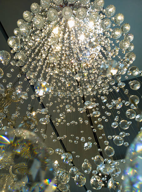 istock Sparkling Crystal Chandelier from Below 2216022619