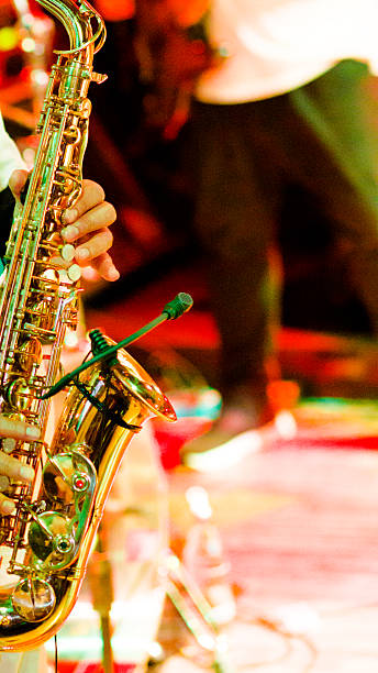 istock Profile view of playing saxophonist 2216024131