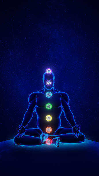 istock Lotus position meditation with visible chakras 2216024182