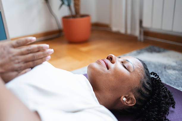 istock Woman practicing mindfulness yoga indoors on a mat with a relaxed expression 2216024300