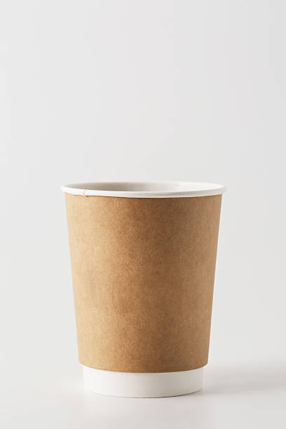 istock Brown Paper Cup for Hot Drinks on Light Background 2216025682