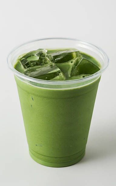 istock Refreshing Green Beverage with Ice in Clear Plastic Cup 2216025799