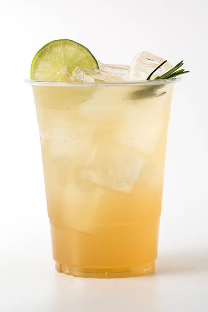 istock Refreshing Citrus Drink with Ice and Lime Garnish in Clear Cup 2216025890