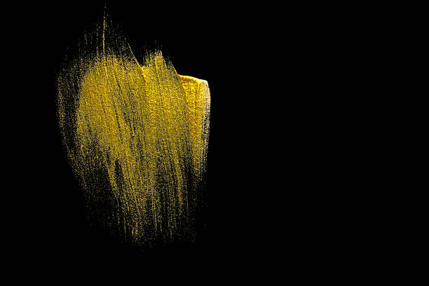 istock Dynamic golden brushstroke paint swirl on black background. 2216026999