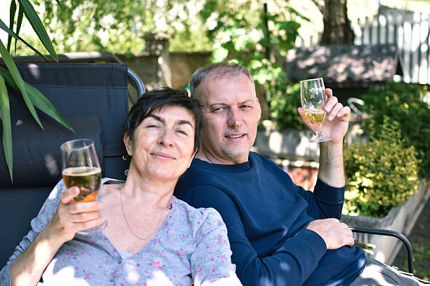 Senior Couple Laughing Together by the Ocean