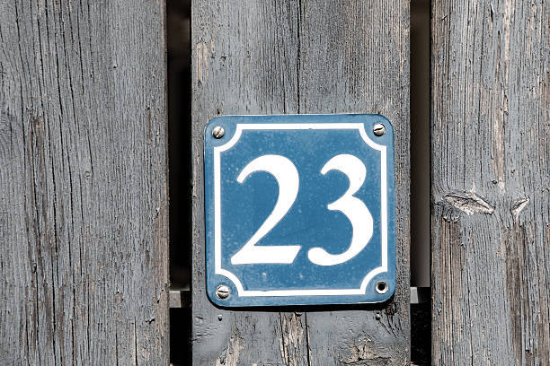 istock house numer t23 at a wooden wall 2216030838