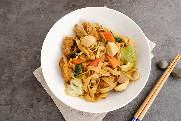 Kwetiaw or Kwetiau, fried rice noodles