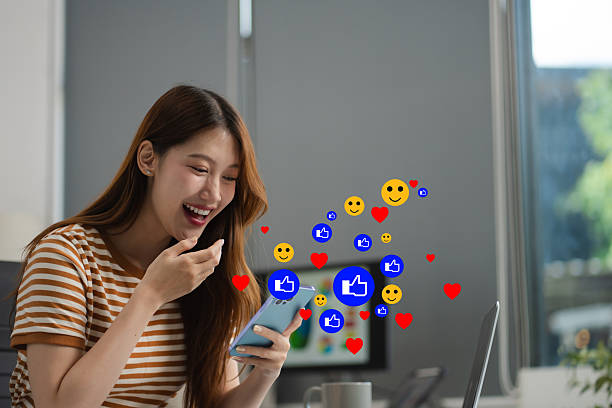 istock Female design using mobile phone play social media in office. 2216037647