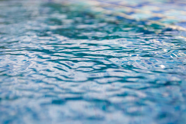 istock Water surface from above. Abstract transparent blue water surface from above 2216037771