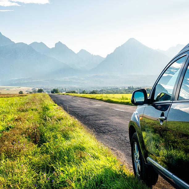 istock car for traveling with a mountain road 2216048656