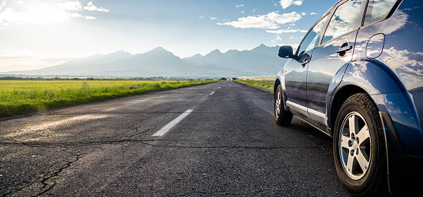 istock car for traveling with a mountain road 2216048724