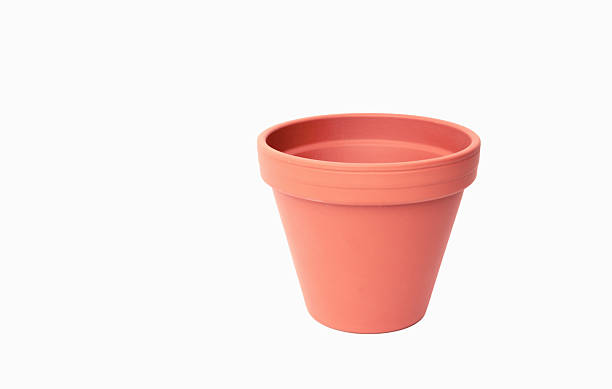 istock Light red pink clay pot isolated on white 2216048904