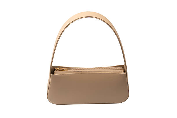 istock Beige women leather bag isolated on white background. 2216055946
