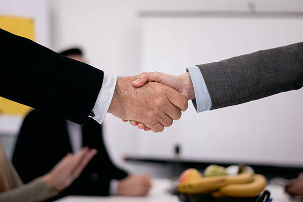 istock Professional handshake symbolizing agreement during a business meeting 2216058534