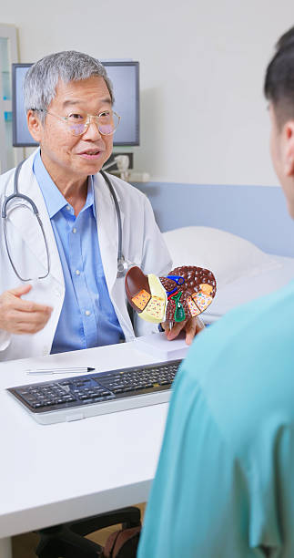 istock asia doctor explain liver condition 2216058785