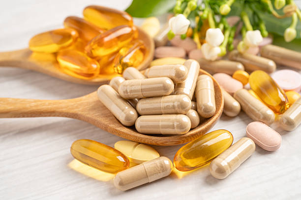 istock Alternative medicine herbal organic capsule drug herb. 2216062429
