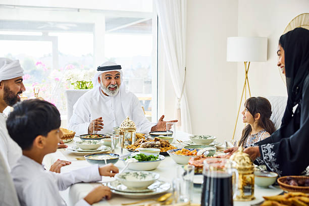 istock Middle eastern family enjoying during lunch 2216062629