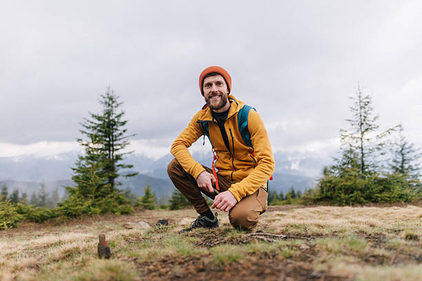 istock The handsome man hiker at the spring mountains 2216066129