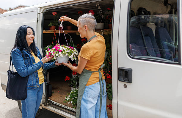 istock Pop-Up Flower Shop from a White Van 2216067149