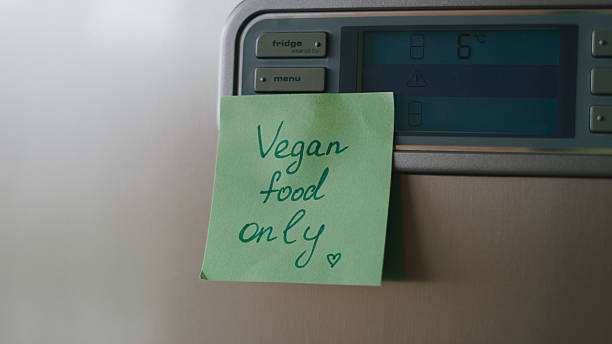 istock Sticky note reminders on kitchen fridge promoting healthy eating and wellness 2216070469