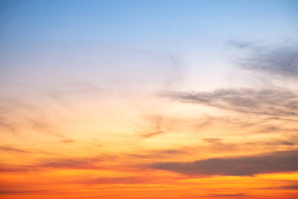 istock Beautiful , luxury soft gradient orange gold clouds and sunlight on the blue sky perfect for the background, take in evening,Twilight, Large size, high definition landscape photo 2216071070