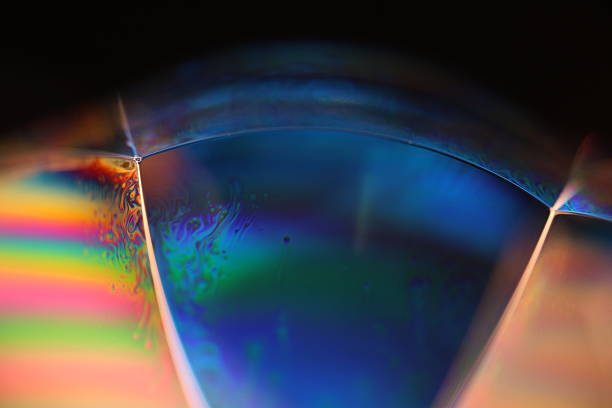 istock Green and blue reflections of liquid in macro, bright liquid surface, natural phenomena 2216075264