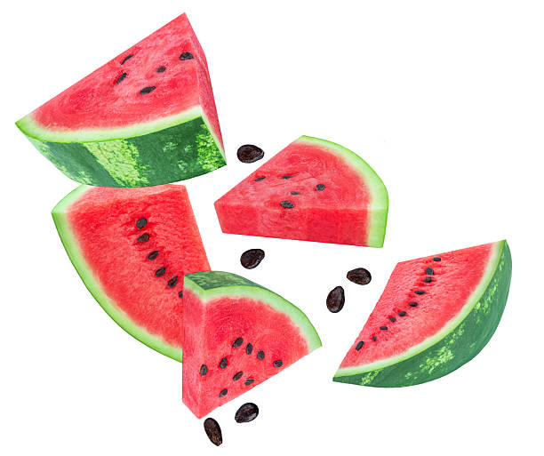 istock Levitating Watermelon triangle slices isolated on white. Watermelon explocion. Flying   watermelon fruit pieces with seeds. Pattern. Summer Creative layout 2216077363