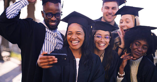 istock Graduates Celebrating Together Outdoors with Joy, Smiles, and Friendship 2216077609