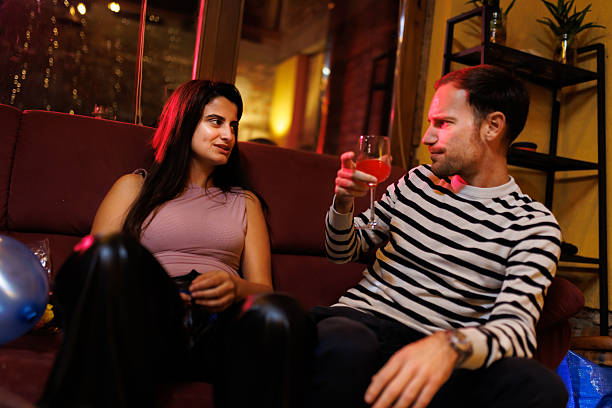 istock Two people in a cozy atmosphere enjoying a drink and deep conversation 2216079585