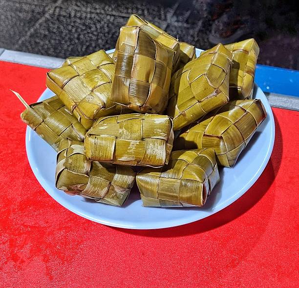 istock Plate filled with ketupat 2216082684