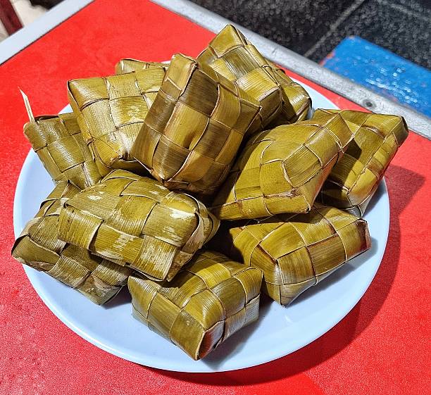 istock Plate filled with ketupat 2216083039