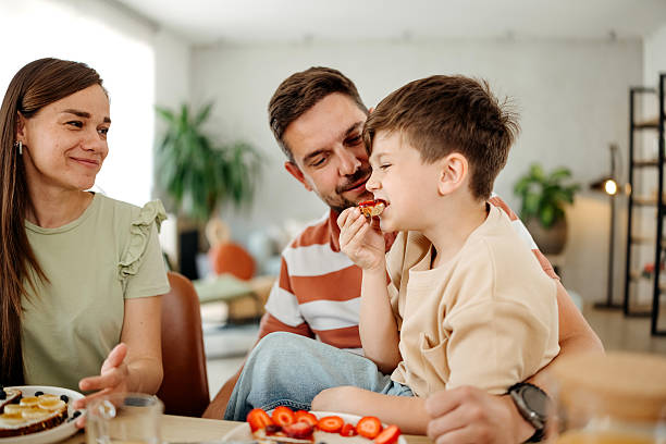 istock Happy family has a healthy meal for breakfast 2216083654