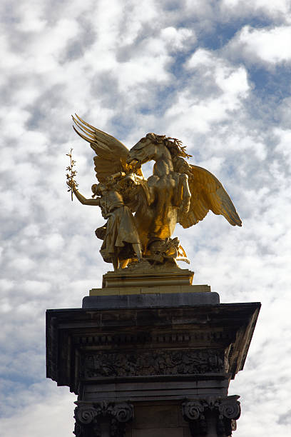 istock golden sculpture called Sciences statue in Paris 2216084489