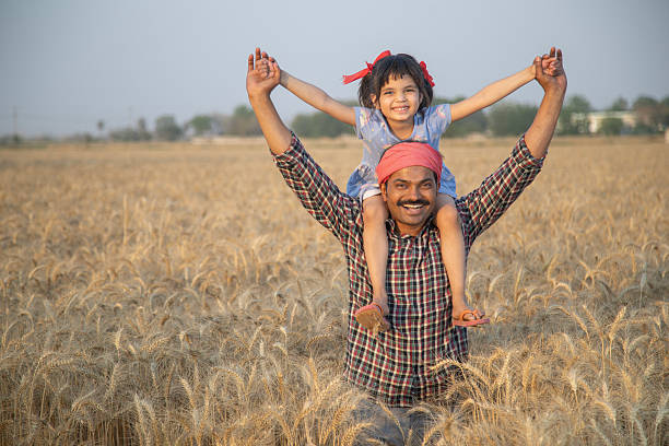 istock Father with happy daughter at organic farm 2216090552