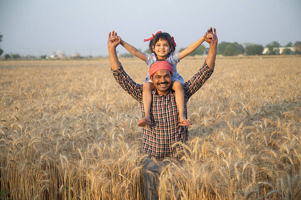 istock Father with happy daughter at organic farm 2216090635