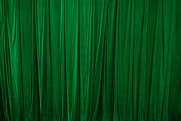 istock Green curtain in theatre background 2216098457