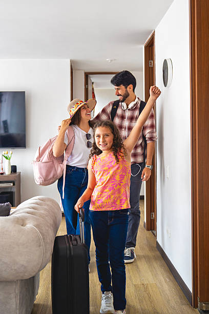 istock Happy family leaving home ready for vacation 2216107080