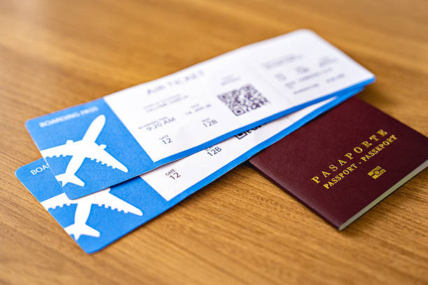 istock Colombian passport and plane tickets on the table. 2216108469